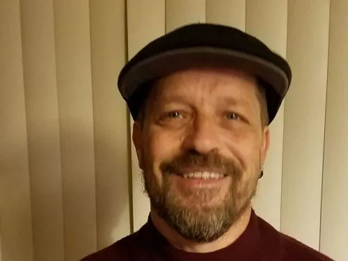 Scott E.