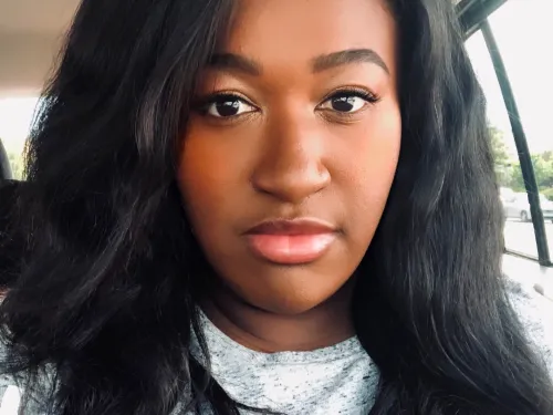 Rhea G.